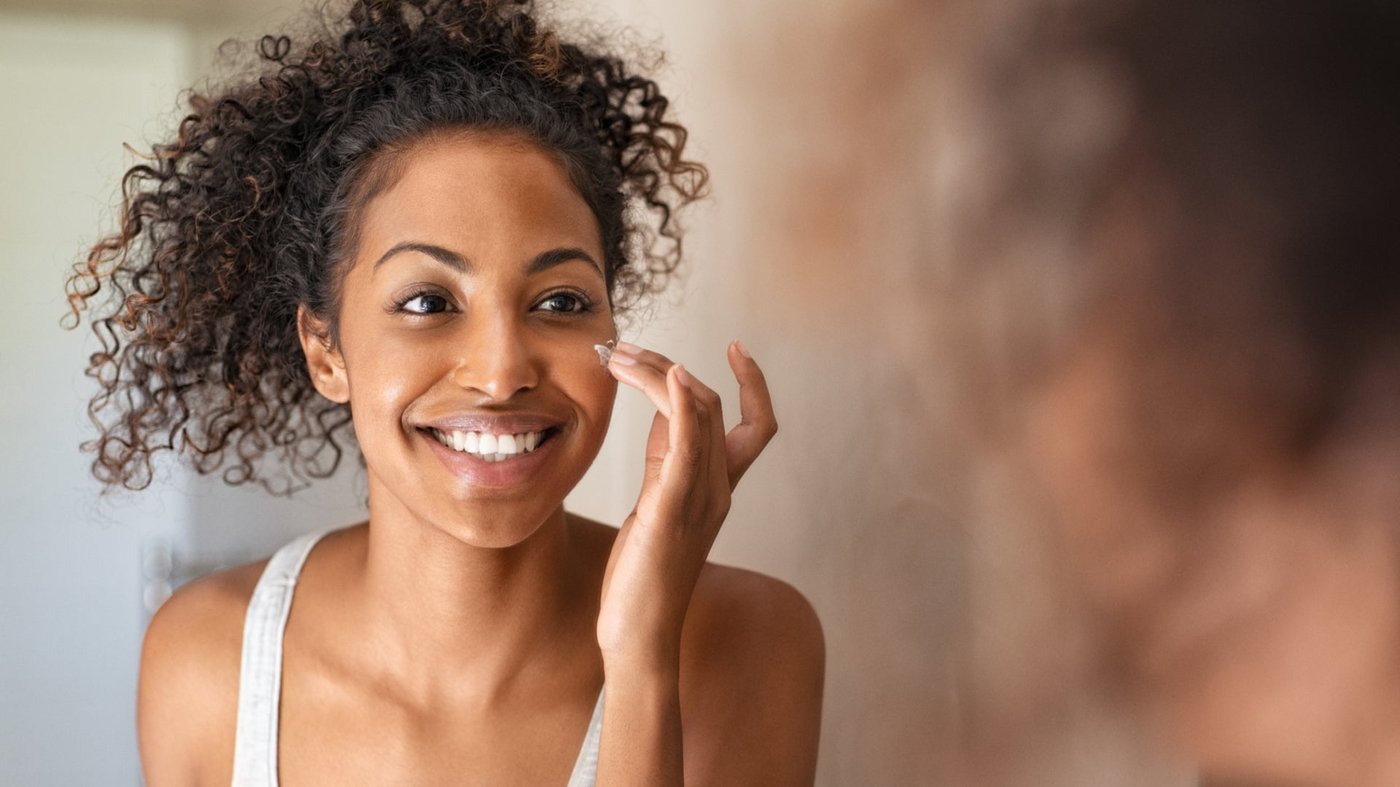 Skincare ritual — applying serum to fresh skin