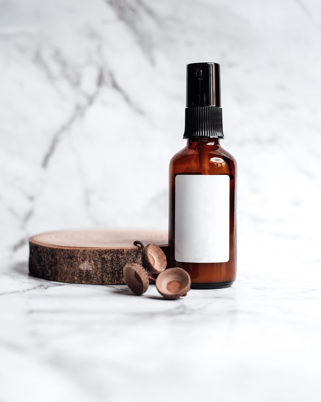 Botanical skincare ingredients and amber glass bottles